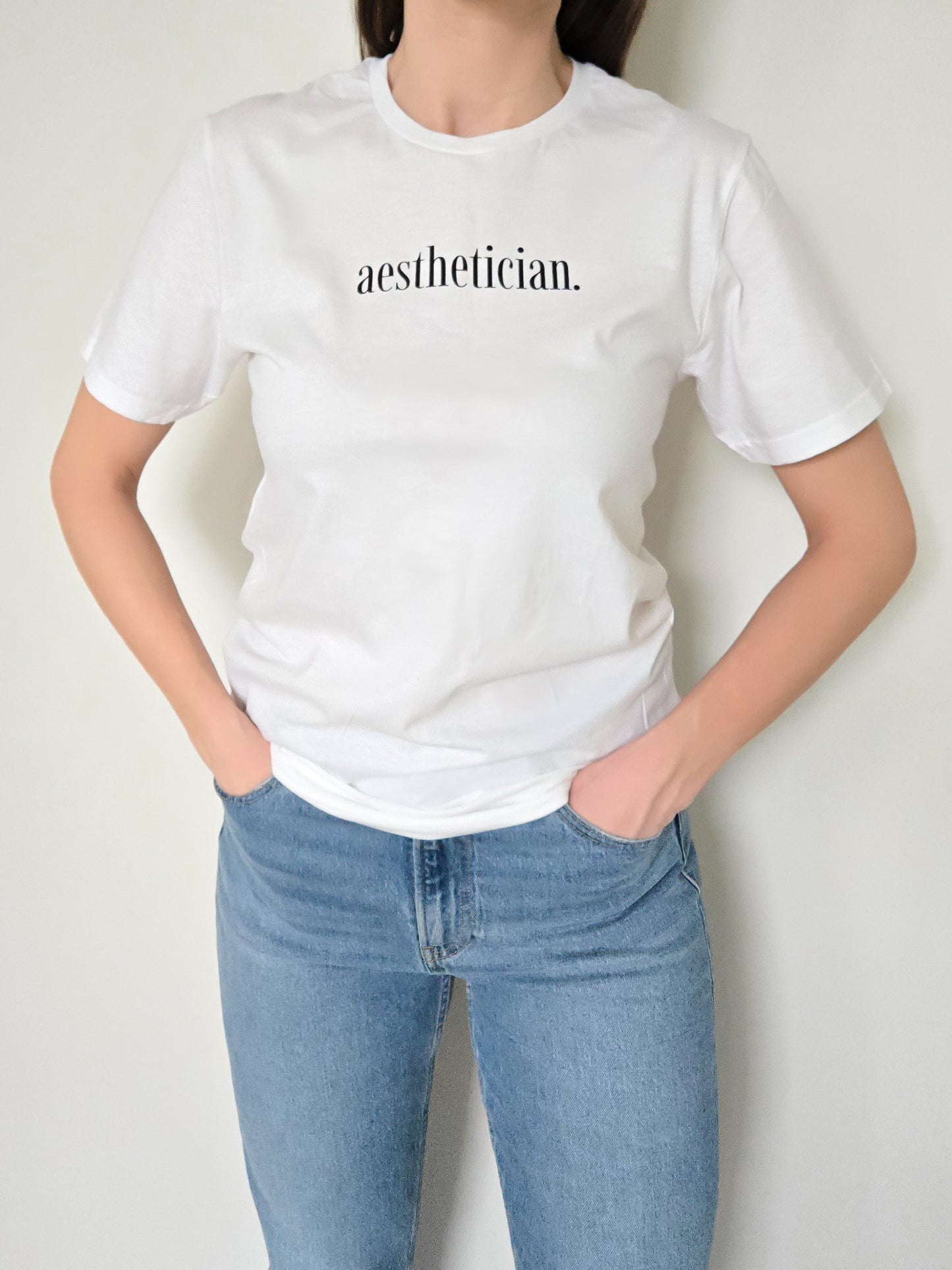 'aesthetician.' Tee- White