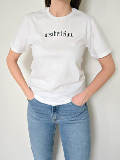 'aesthetician.' Tee- White